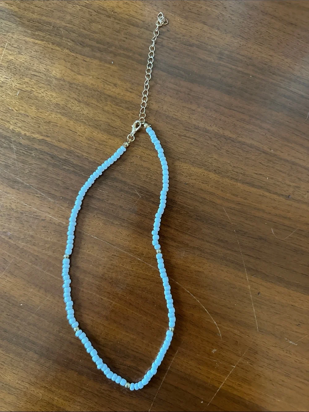 White Beaded Necklace with Gold Accent Beads‎